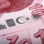 Icona di un documento legale con testo "Legge 104" e simboli di accesso e supporto.